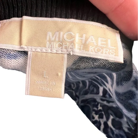 Micheal Kors form fitting, animal print dress. Stretchy material. Lightly worn - Picture 3 of 4